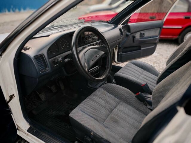 Белый Тойота Королла, объемом двигателя 1.3 л и пробегом 300 тыс. км за 1300 $, фото 17 на Automoto.ua