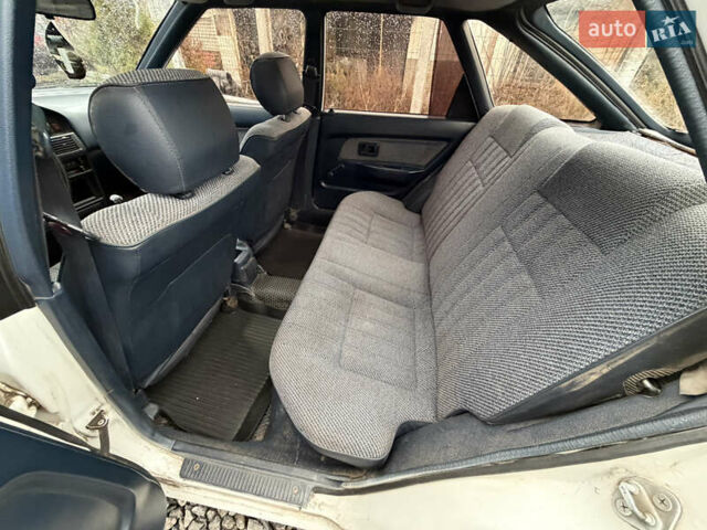 Білий Тойота Королла, об'ємом двигуна 1.3 л та пробігом 300 тис. км за 1300 $, фото 14 на Automoto.ua