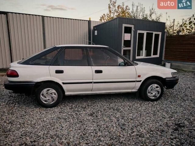 Белый Тойота Королла, объемом двигателя 1.3 л и пробегом 270 тыс. км за 1300 $, фото 9 на Automoto.ua