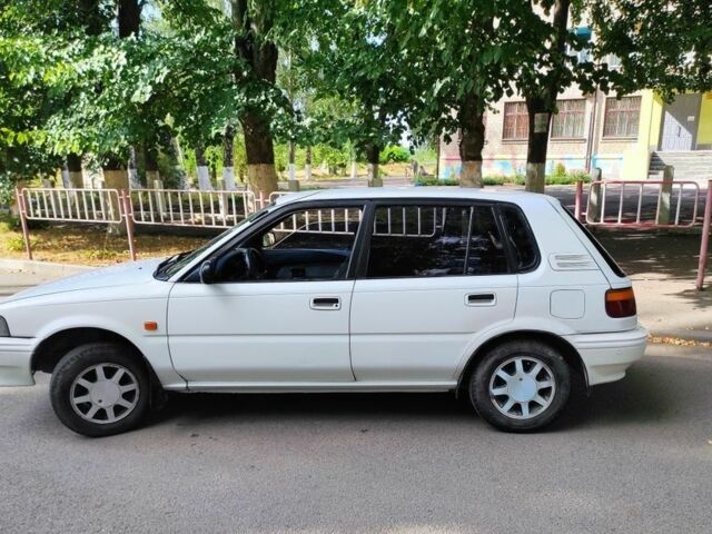 Білий Тойота Королла, об'ємом двигуна 1.3 л та пробігом 214 тис. км за 1400 $, фото 1 на Automoto.ua