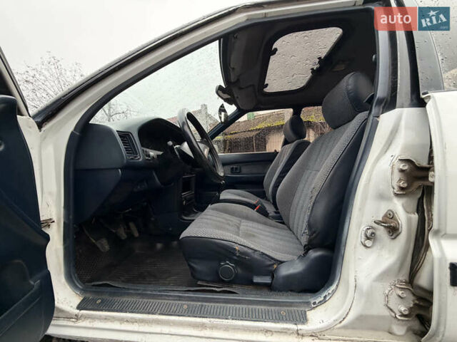 Білий Тойота Королла, об'ємом двигуна 1.3 л та пробігом 300 тис. км за 1300 $, фото 10 на Automoto.ua