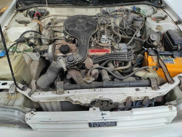 Білий Тойота Королла, об'ємом двигуна 1.3 л та пробігом 214 тис. км за 1400 $, фото 3 на Automoto.ua