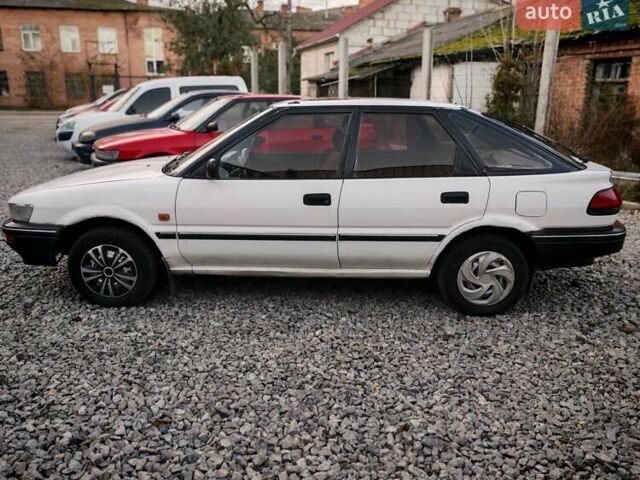 Белый Тойота Королла, объемом двигателя 1.3 л и пробегом 270 тыс. км за 1300 $, фото 5 на Automoto.ua