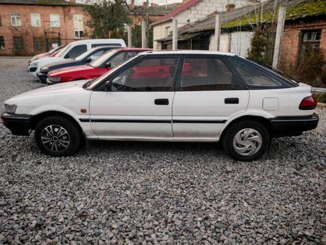 Белый Тойота Королла, объемом двигателя 1.3 л и пробегом 300 тыс. км за 1300 $, фото 7 на Automoto.ua