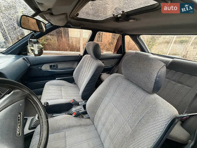 Білий Тойота Королла, об'ємом двигуна 1.3 л та пробігом 300 тис. км за 1300 $, фото 11 на Automoto.ua