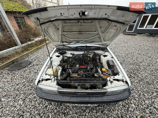 Белый Тойота Королла, объемом двигателя 1.3 л и пробегом 350 тыс. км за 1200 $, фото 22 на Automoto.ua