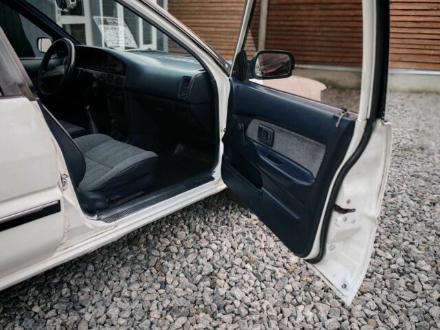 Белый Тойота Королла, объемом двигателя 1.3 л и пробегом 300 тыс. км за 1300 $, фото 12 на Automoto.ua