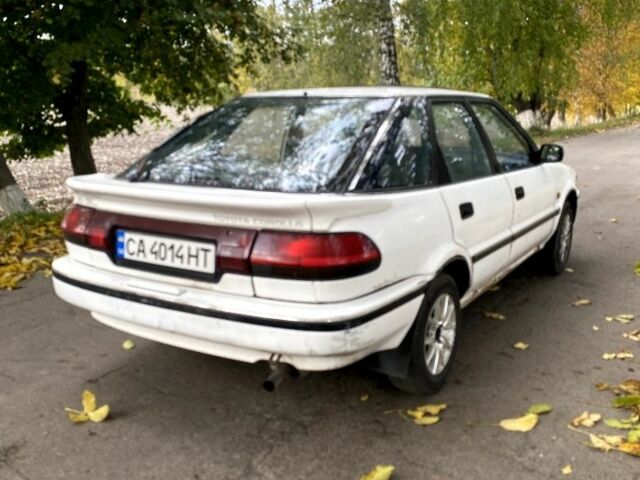 Белый Тойота Королла, объемом двигателя 1.6 л и пробегом 490 тыс. км за 850 $, фото 2 на Automoto.ua