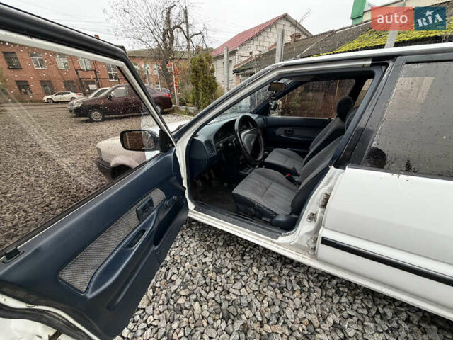 Білий Тойота Королла, об'ємом двигуна 1.3 л та пробігом 300 тис. км за 1300 $, фото 9 на Automoto.ua