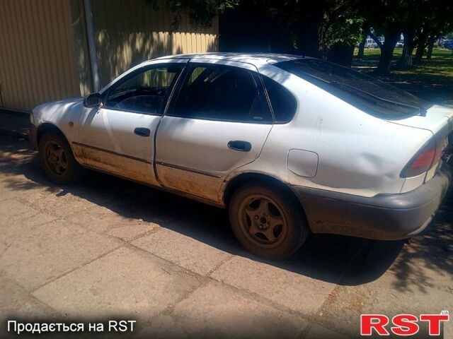 Белый Тойота Королла, объемом двигателя 1.3 л и пробегом 462 тыс. км за 1560 $, фото 1 на Automoto.ua