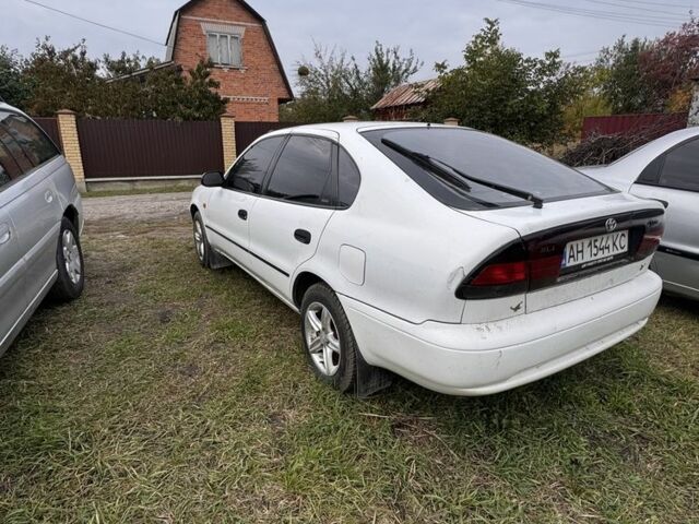 Белый Тойота Королла, объемом двигателя 1.4 л и пробегом 250 тыс. км за 1500 $, фото 2 на Automoto.ua