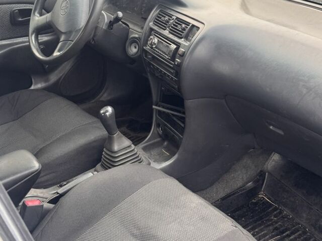 Белый Тойота Королла, объемом двигателя 1.4 л и пробегом 250 тыс. км за 1500 $, фото 1 на Automoto.ua