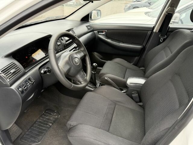 Белый Тойота Королла, объемом двигателя 1.4 л и пробегом 169 тыс. км за 5000 $, фото 16 на Automoto.ua