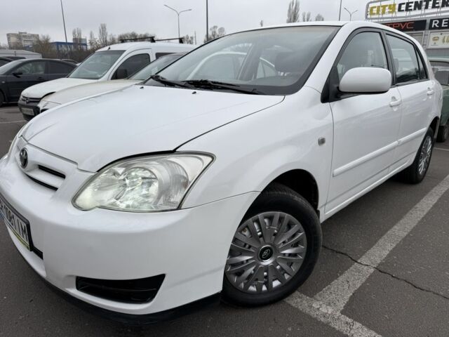 Белый Тойота Королла, объемом двигателя 1.4 л и пробегом 169 тыс. км за 5000 $, фото 1 на Automoto.ua