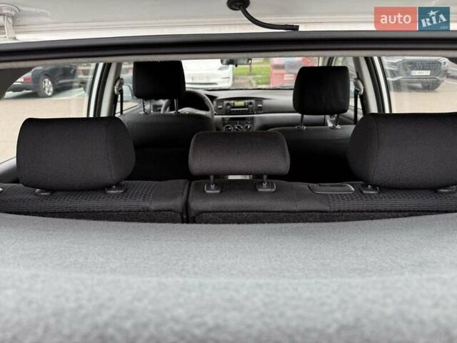 Белый Тойота Королла, объемом двигателя 1.4 л и пробегом 169 тыс. км за 5000 $, фото 19 на Automoto.ua