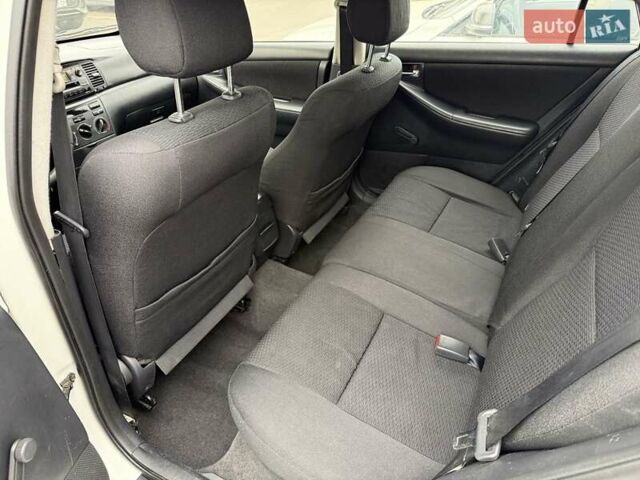 Белый Тойота Королла, объемом двигателя 1.4 л и пробегом 169 тыс. км за 5000 $, фото 17 на Automoto.ua