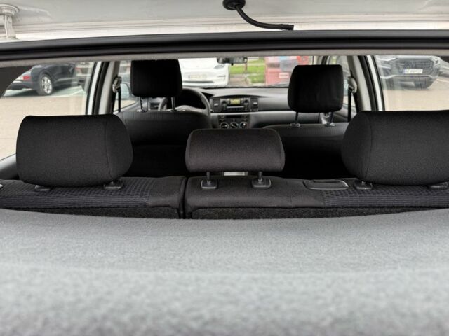 Белый Тойота Королла, объемом двигателя 1.4 л и пробегом 169 тыс. км за 5000 $, фото 20 на Automoto.ua