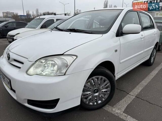 Білий Тойота Королла, об'ємом двигуна 1.4 л та пробігом 169 тис. км за 4950 $, фото 1 на Automoto.ua