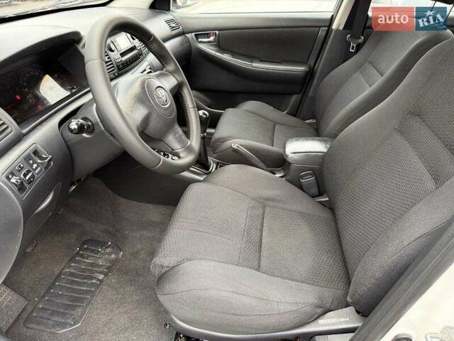 Белый Тойота Королла, объемом двигателя 1.4 л и пробегом 169 тыс. км за 5000 $, фото 14 на Automoto.ua