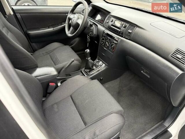 Белый Тойота Королла, объемом двигателя 1.4 л и пробегом 169 тыс. км за 5000 $, фото 20 на Automoto.ua