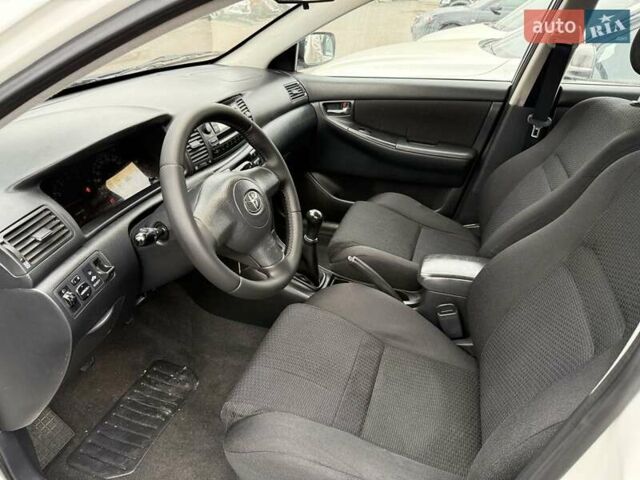 Белый Тойота Королла, объемом двигателя 1.4 л и пробегом 169 тыс. км за 5000 $, фото 15 на Automoto.ua