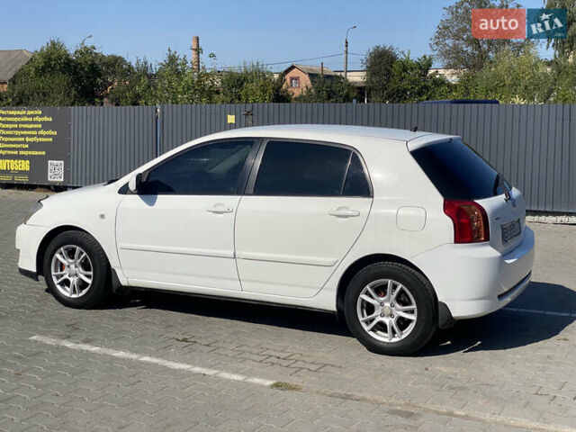 Белый Тойота Королла, объемом двигателя 1.4 л и пробегом 227 тыс. км за 3555 $, фото 4 на Automoto.ua