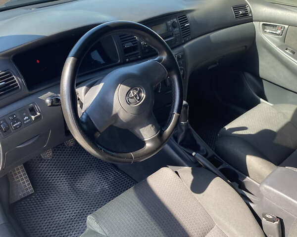 Белый Тойота Королла, объемом двигателя 1.4 л и пробегом 227 тыс. км за 3555 $, фото 5 на Automoto.ua