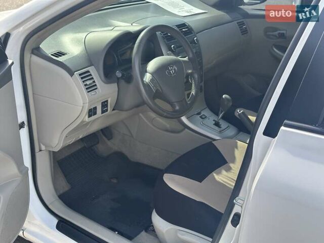Білий Тойота Королла, об'ємом двигуна 1.6 л та пробігом 204 тис. км за 6990 $, фото 11 на Automoto.ua