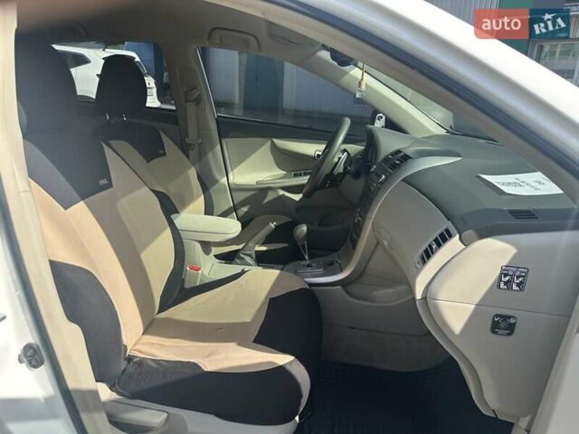 Білий Тойота Королла, об'ємом двигуна 1.6 л та пробігом 204 тис. км за 6990 $, фото 22 на Automoto.ua