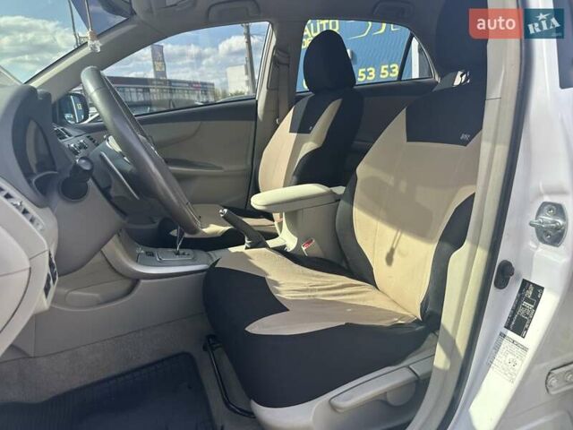 Білий Тойота Королла, об'ємом двигуна 1.6 л та пробігом 204 тис. км за 6990 $, фото 12 на Automoto.ua