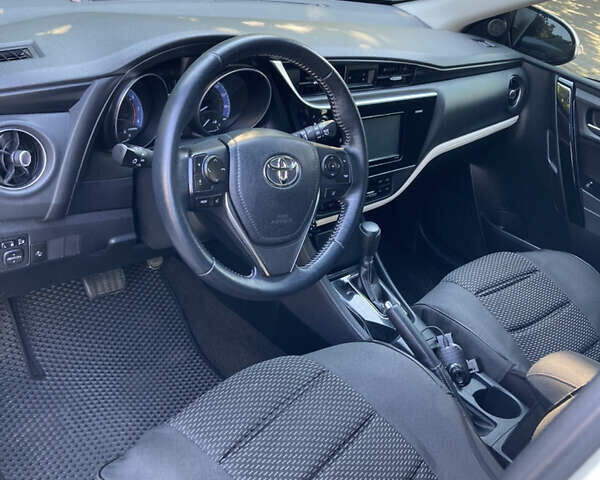 Белый Тойота Королла, объемом двигателя 1.8 л и пробегом 115 тыс. км за 14000 $, фото 4 на Automoto.ua