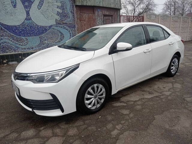 Белый Тойота Королла, объемом двигателя 1.3 л и пробегом 179 тыс. км за 10500 $, фото 1 на Automoto.ua