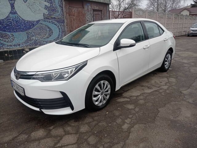Белый Тойота Королла, объемом двигателя 1.3 л и пробегом 179 тыс. км за 10500 $, фото 4 на Automoto.ua