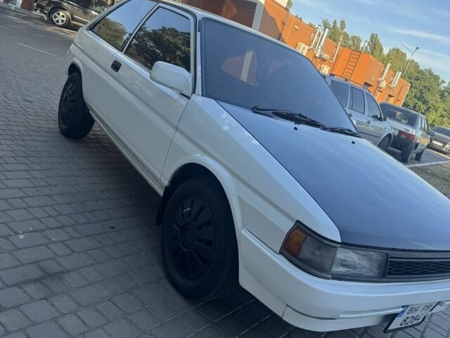 Белый Тойота Королла, объемом двигателя 1.3 л и пробегом 235 тыс. км за 1350 $, фото 5 на Automoto.ua