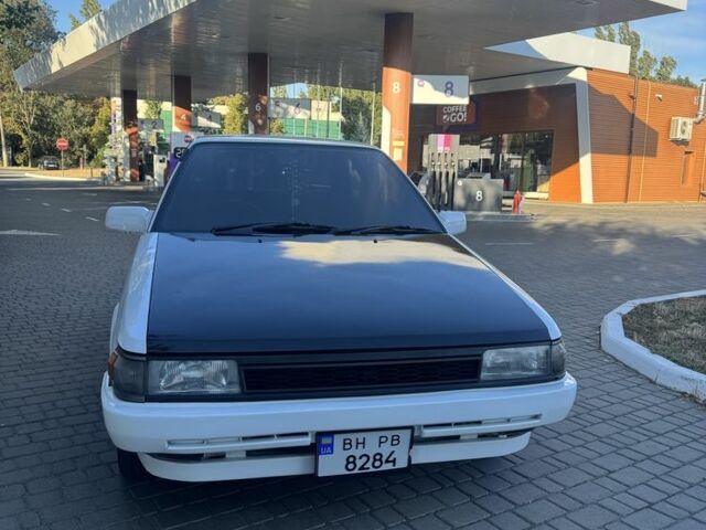 Белый Тойота Королла, объемом двигателя 1.3 л и пробегом 235 тыс. км за 1350 $, фото 3 на Automoto.ua