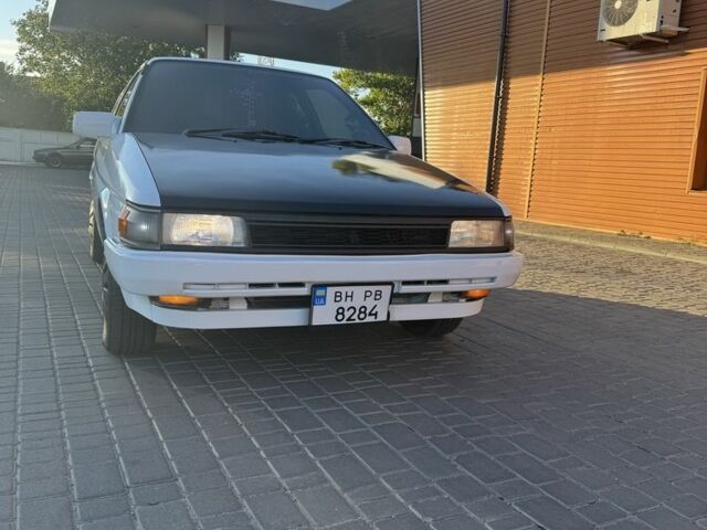 Белый Тойота Королла, объемом двигателя 1.3 л и пробегом 235 тыс. км за 1350 $, фото 2 на Automoto.ua