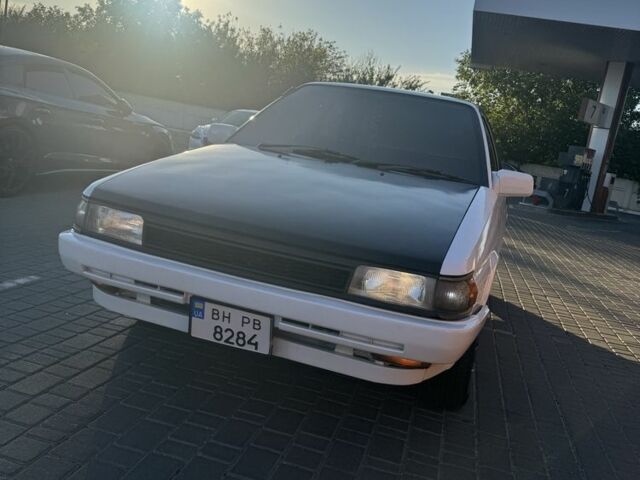 Белый Тойота Королла, объемом двигателя 1.3 л и пробегом 235 тыс. км за 1350 $, фото 1 на Automoto.ua