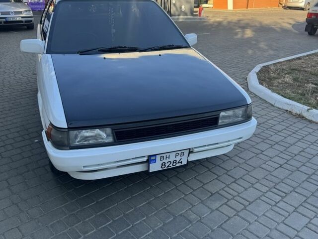 Белый Тойота Королла, объемом двигателя 1.3 л и пробегом 235 тыс. км за 1350 $, фото 6 на Automoto.ua