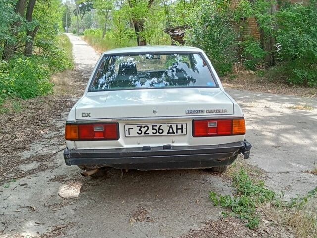 Белый Тойота Королла, объемом двигателя 1.3 л и пробегом 238 тыс. км за 595 $, фото 3 на Automoto.ua