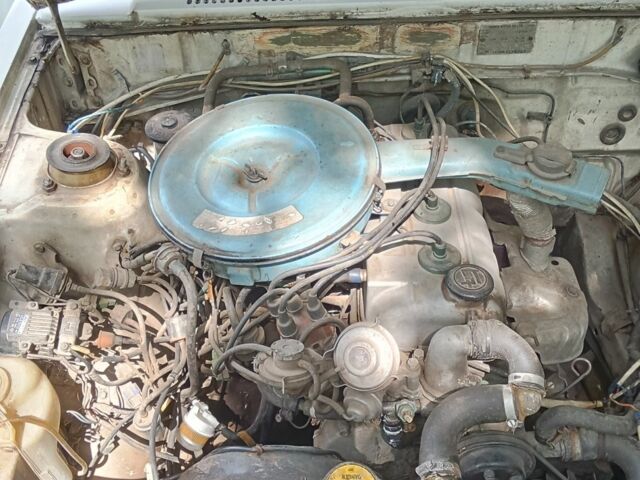 Белый Тойота Королла, объемом двигателя 1.3 л и пробегом 238 тыс. км за 595 $, фото 5 на Automoto.ua