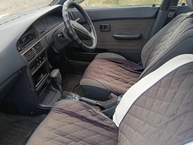 Тойота Королла 1990 в Кропивницком (Кировограде) на Automoto.ua Белый Тойота Королла, объемом двигателя 1.8 л и пробегом 200 тыс. км за 700 $, фото 4 на Automoto.ua