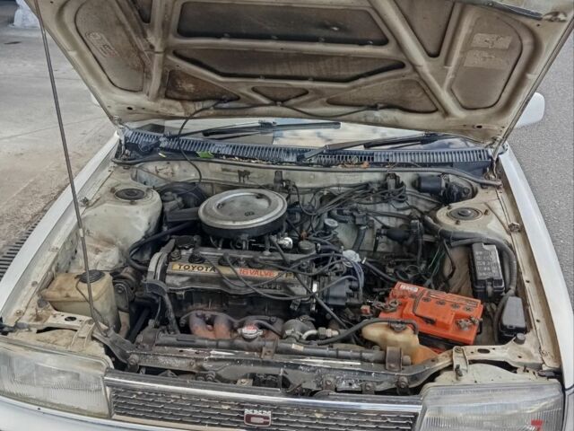 Белый Тойота Королла, объемом двигателя 1 л и пробегом 300 тыс. км за 1250 $, фото 4 на Automoto.ua