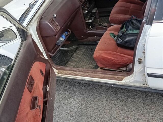 Белый Тойота Королла, объемом двигателя 1 л и пробегом 300 тыс. км за 1250 $, фото 1 на Automoto.ua