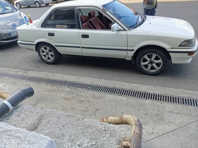 Белый Тойота Королла, объемом двигателя 1 л и пробегом 300 тыс. км за 1250 $, фото 7 на Automoto.ua