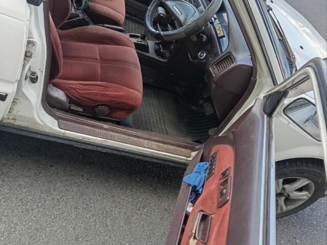 Белый Тойота Королла, объемом двигателя 1 л и пробегом 300 тыс. км за 1250 $, фото 2 на Automoto.ua