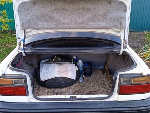 Белый Тойота Королла, объемом двигателя 1.3 л и пробегом 360 тыс. км за 1850 $, фото 4 на Automoto.ua