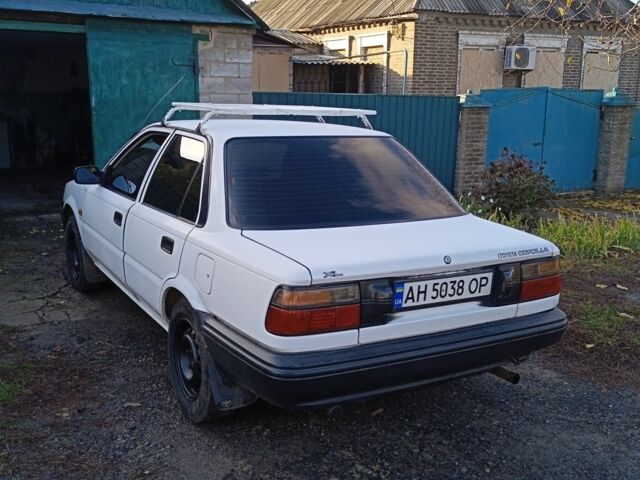 Белый Тойота Королла, объемом двигателя 1.3 л и пробегом 360 тыс. км за 1850 $, фото 2 на Automoto.ua