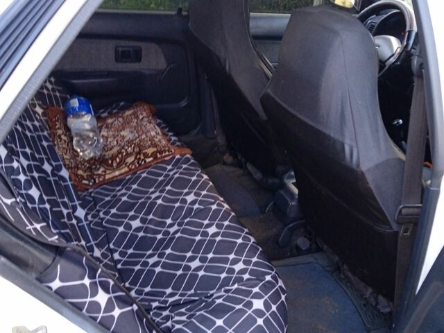 Белый Тойота Королла, объемом двигателя 1.3 л и пробегом 360 тыс. км за 1850 $, фото 5 на Automoto.ua