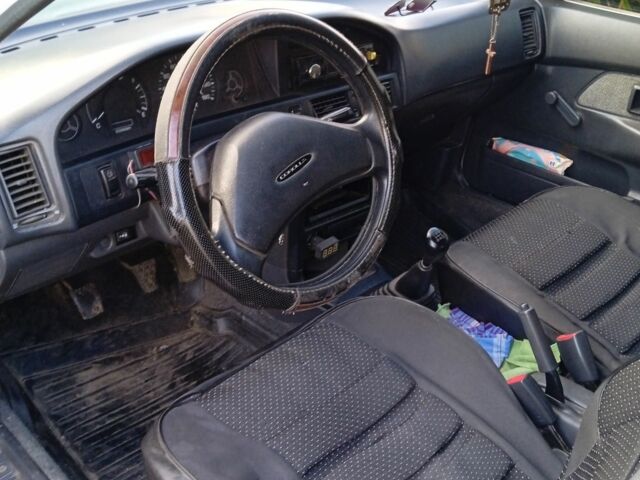 Белый Тойота Королла, объемом двигателя 1.3 л и пробегом 360 тыс. км за 1850 $, фото 7 на Automoto.ua