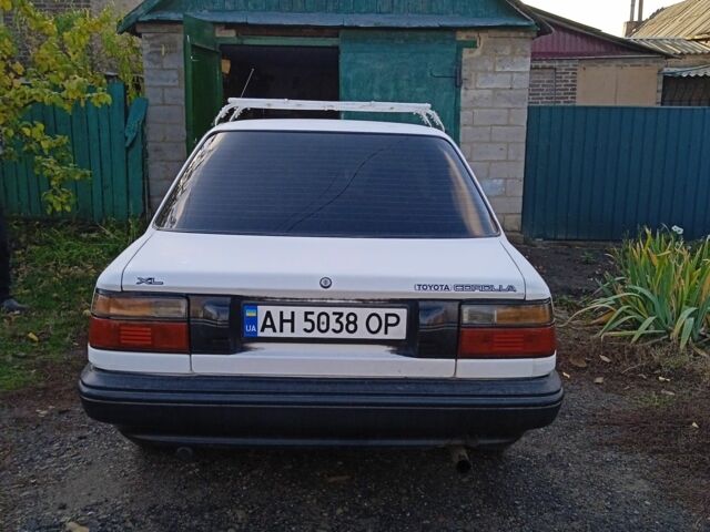 Белый Тойота Королла, объемом двигателя 1.3 л и пробегом 360 тыс. км за 1850 $, фото 3 на Automoto.ua